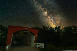 Image of a covered bridge at night