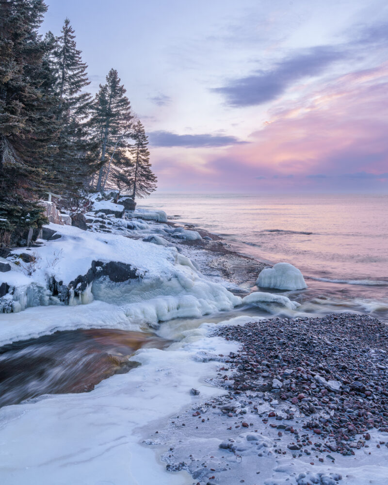 Image of a lake shoreline with snow and ice