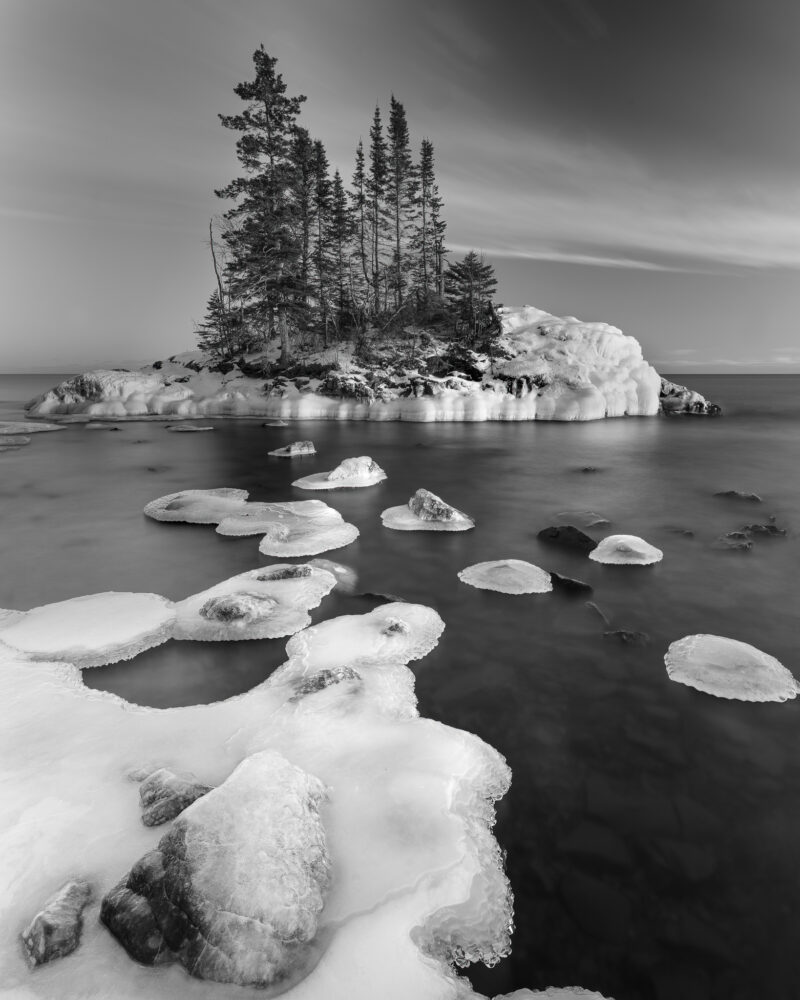 Black and White image of Snow and Ice on a small island