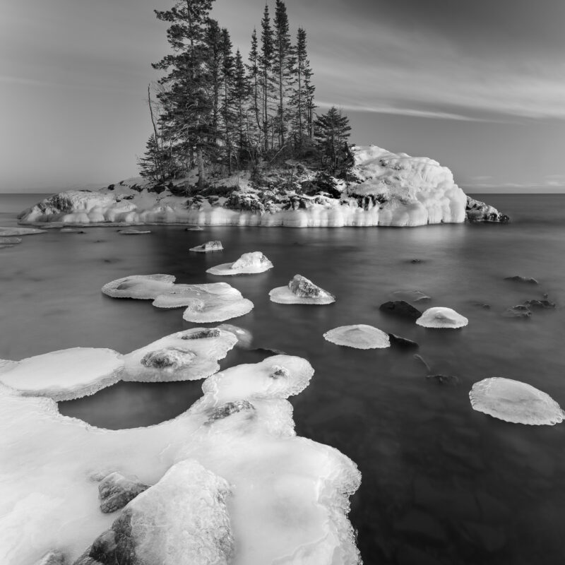 Black and White image of Snow and Ice on a small island